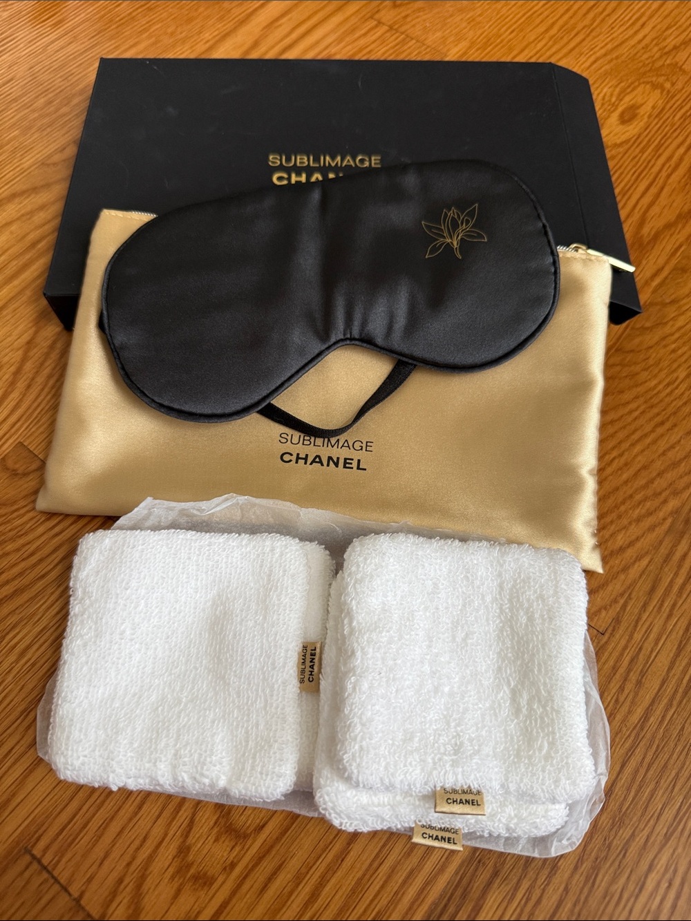 Chanel Sublimage pouch, sleeping eye mask and set of 4 makeup remover pads.